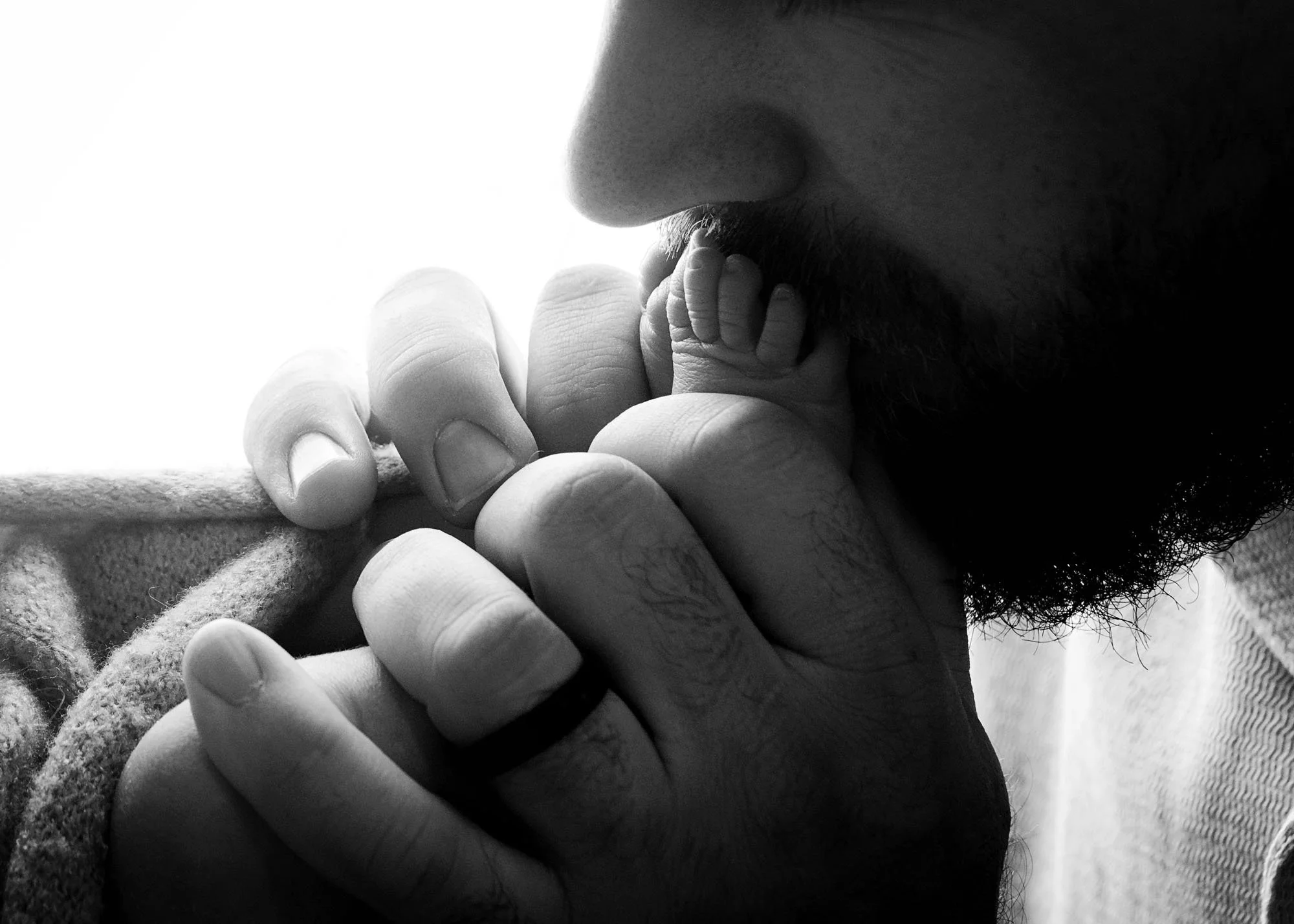 Close up of newborn back wrinkles and soft baby skin