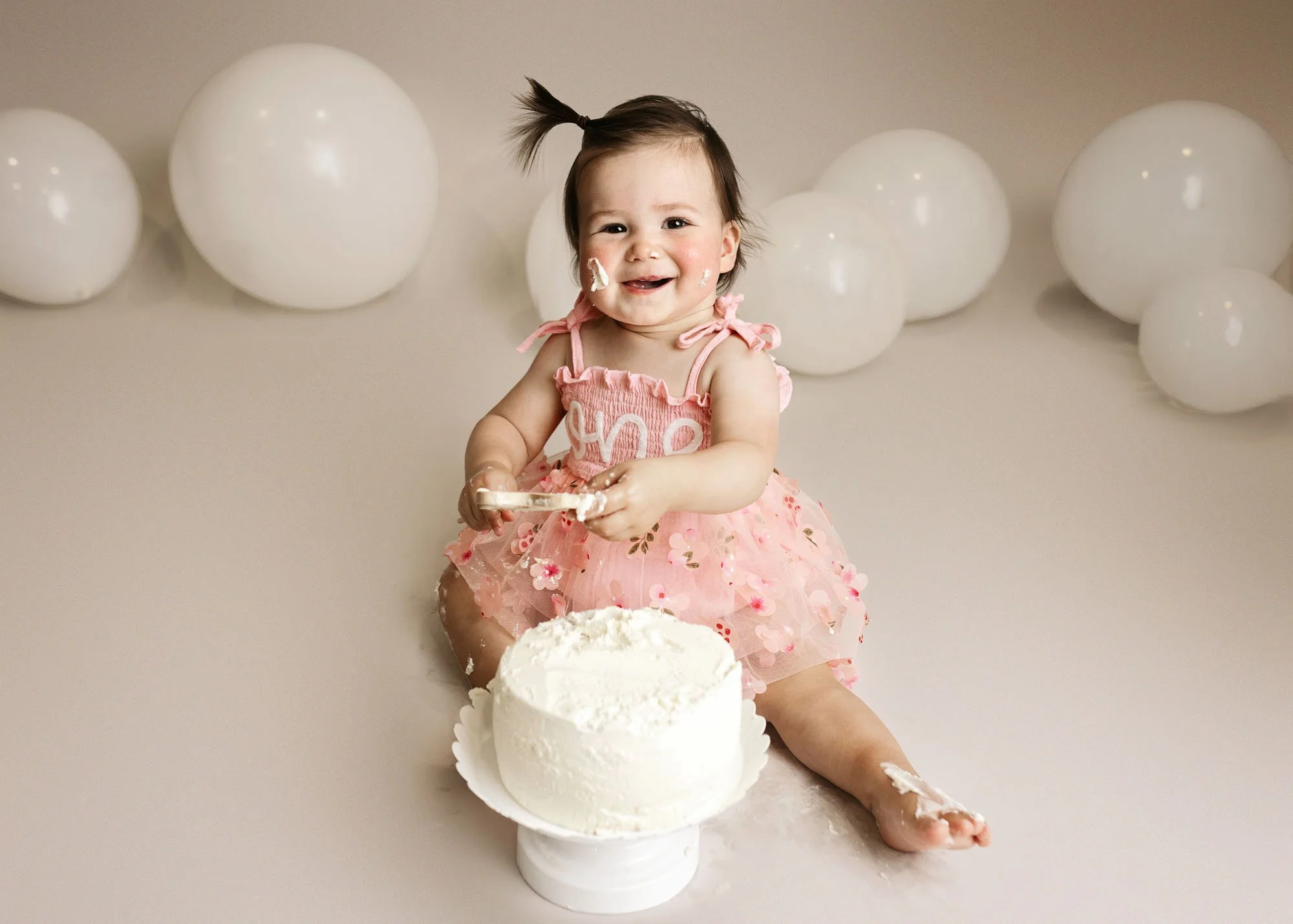 simple white theme clean cake smash with baby girl