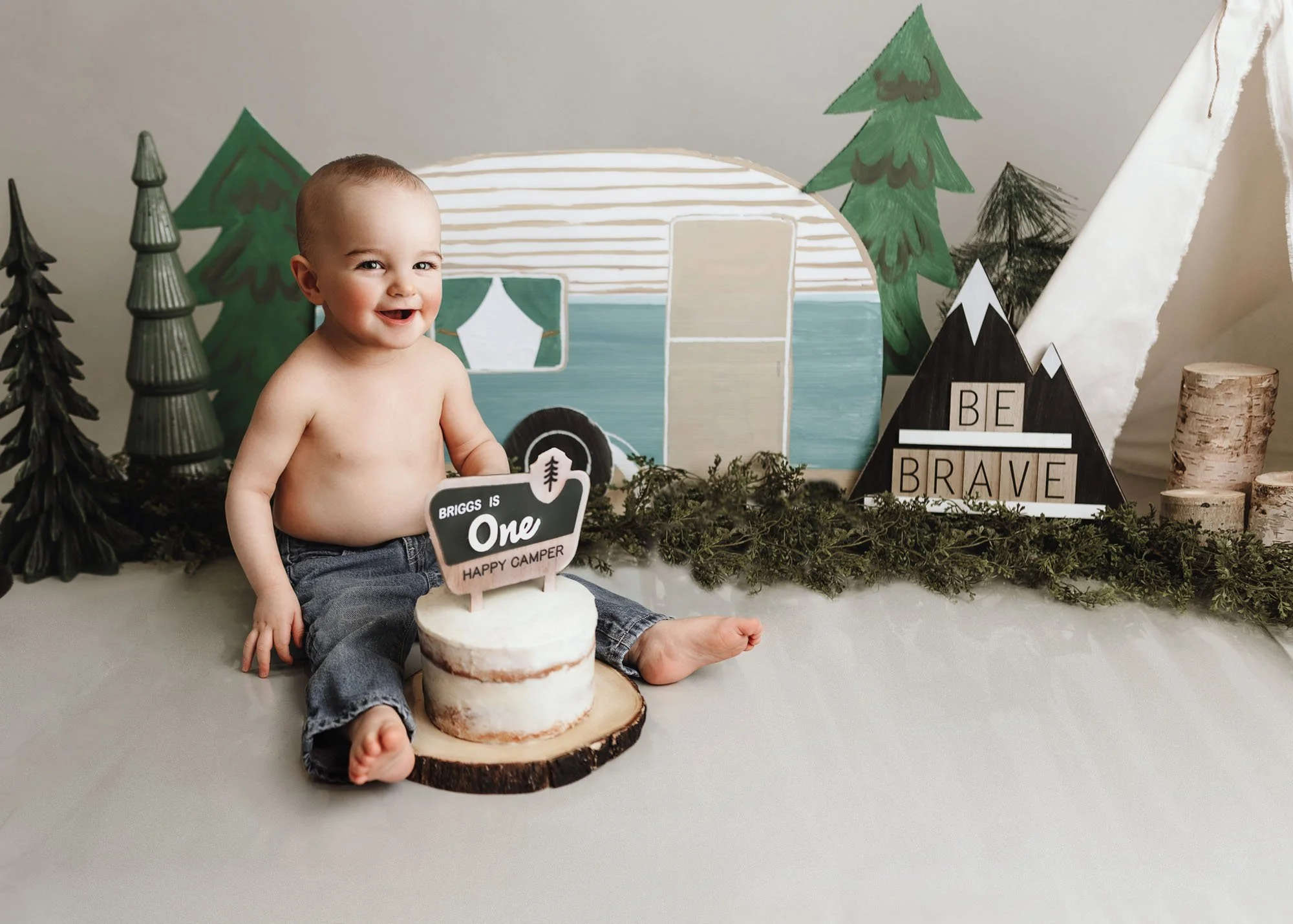 First birthday cake smash with camping theme props