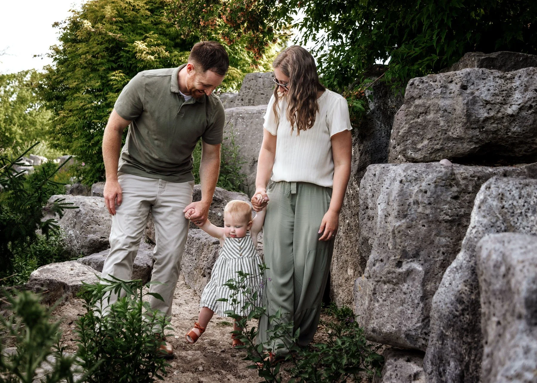 Family session with dramatic rocks, rivers, and pine trees