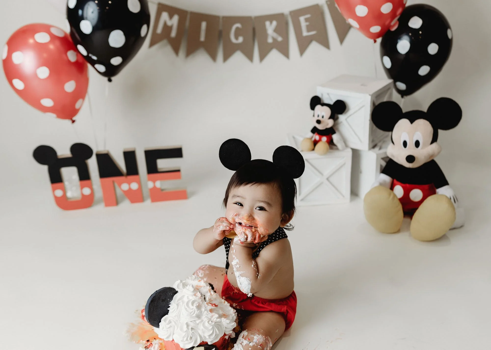 1 year old Mickey Mouse themed cake smash session