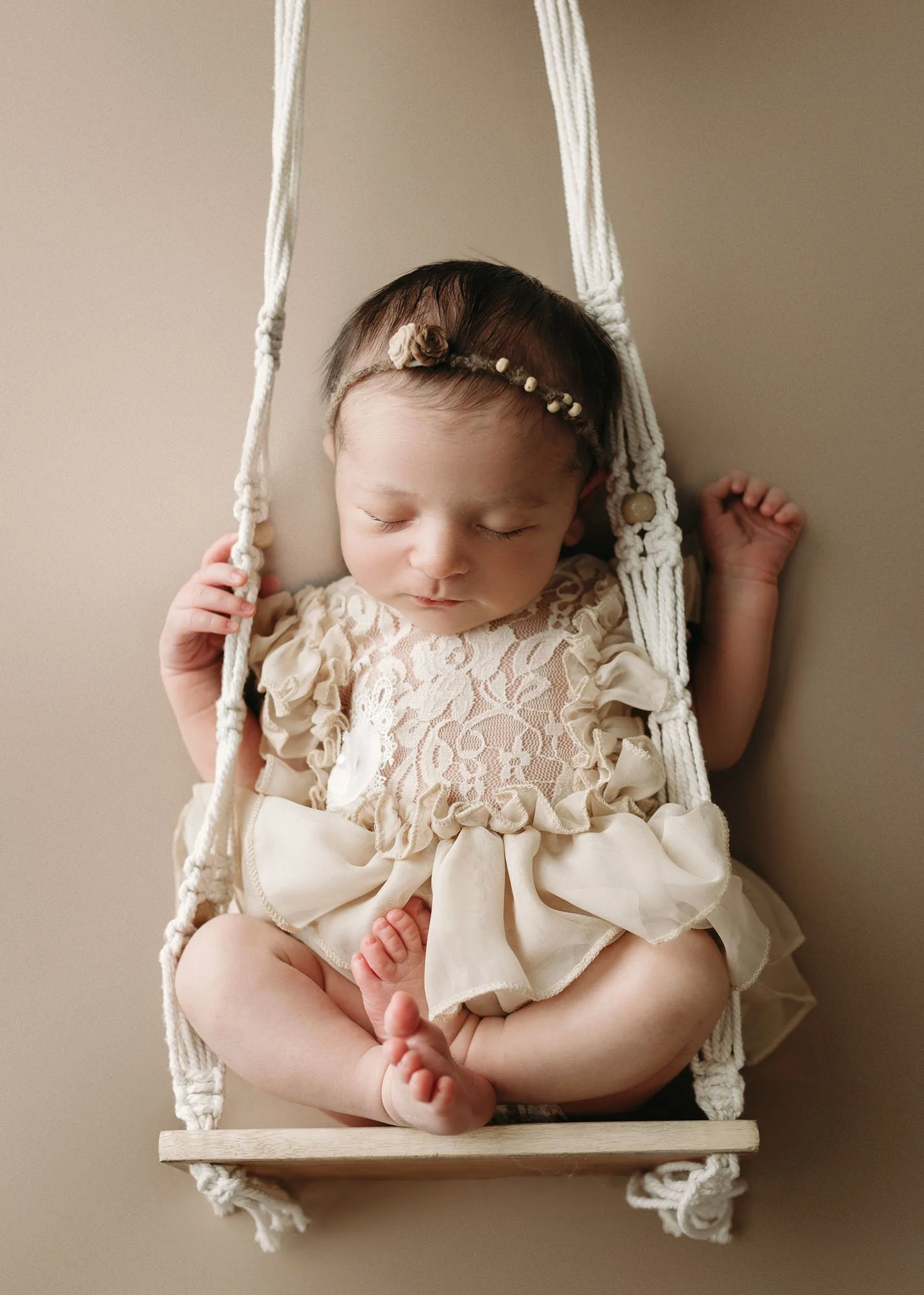 Newborn in heart bowl with Valentine inspired styling