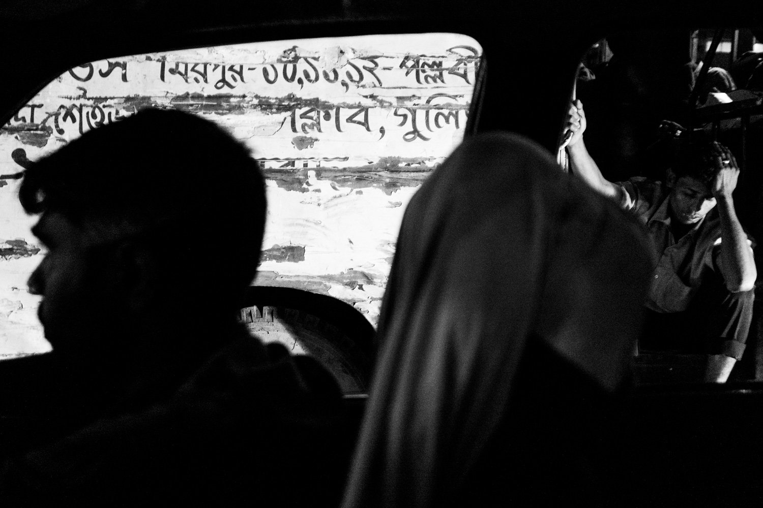 Bangladesh. Dhaka. Homeless young boy. 2013.