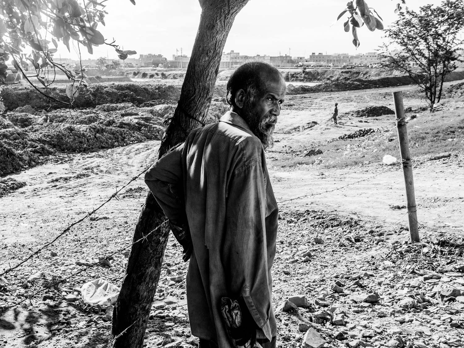 Bangladesh. Dhaka. Homeless young boy. 2013.