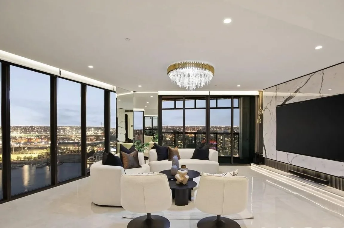 Moda Interior Styling, professional home staging and property styling in Geelong, a luxury apartment living room with city views and elegant decor styled for sale.