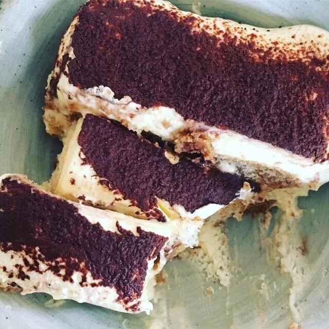 lady fingers espresso simple syrup layered with mascarpone zabaglione sauce and dusted with cocoa powder