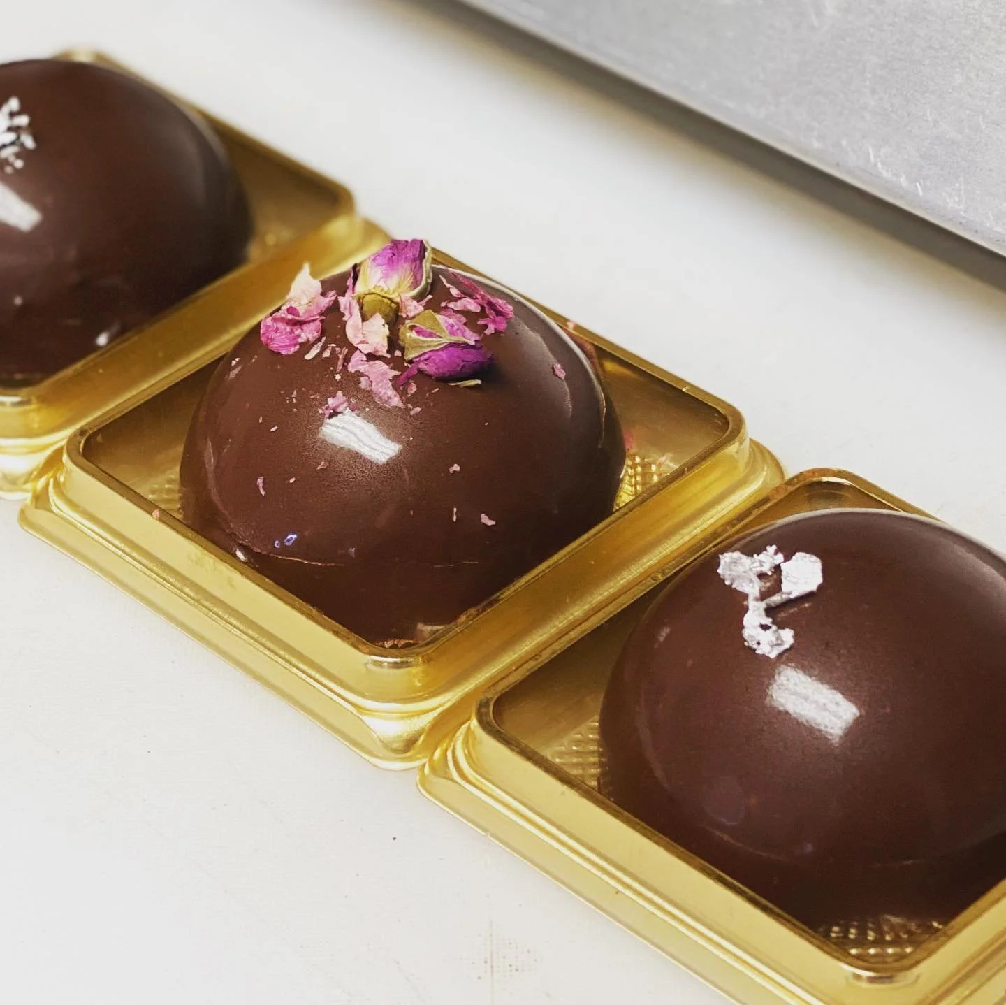 Shown is our chocolate mousse dome dessert!