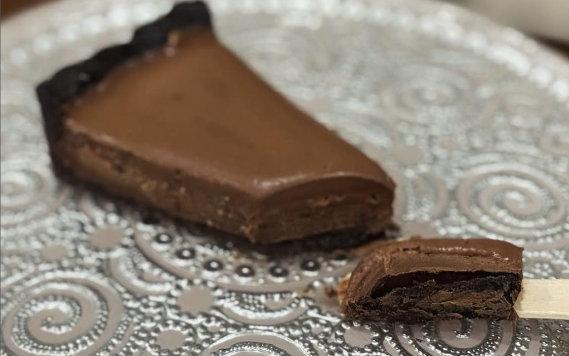 gluten free dark chocolate crust filled with a layer of italian job sipping chocolate, chocolate mousse and dark chocolate ganache layer