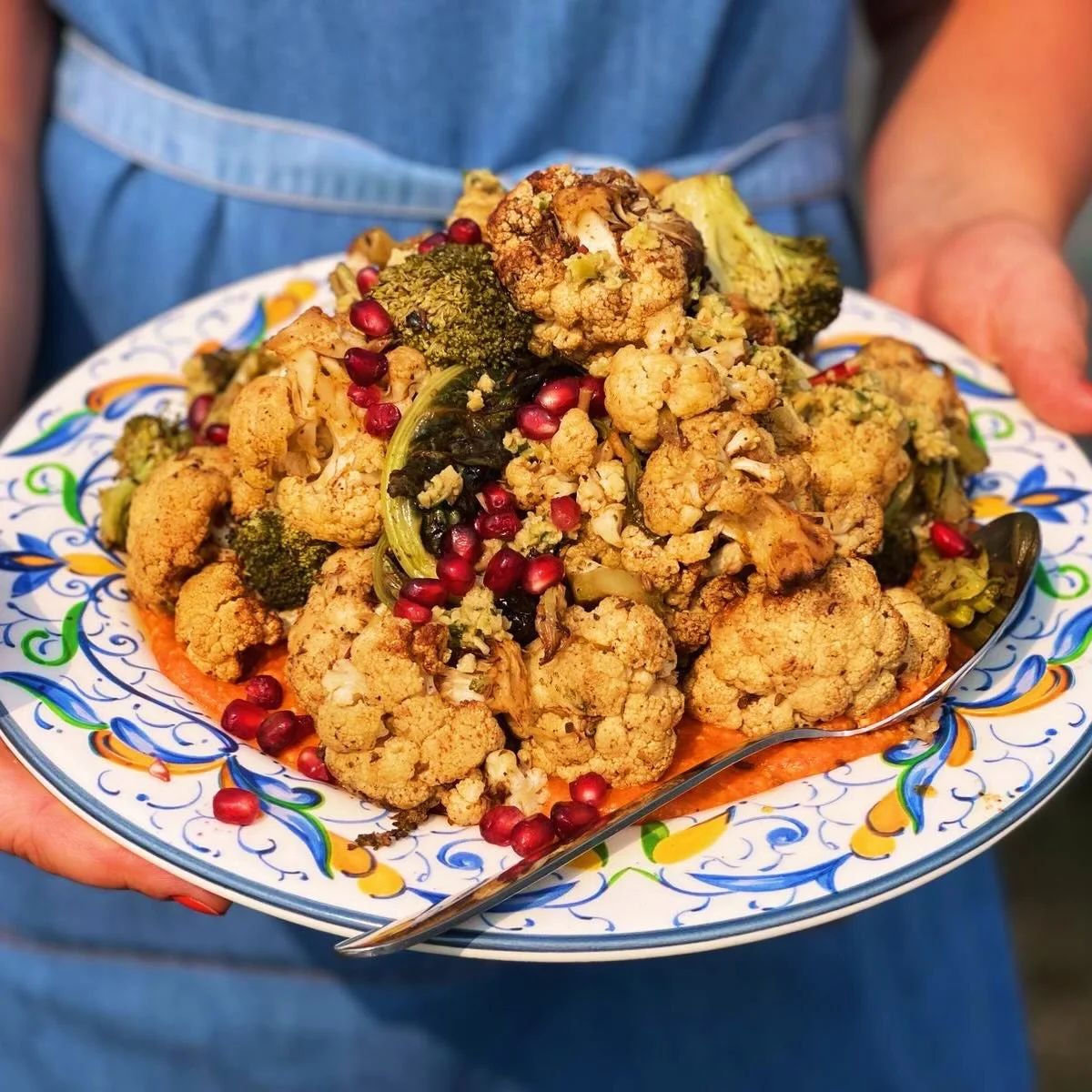 One of our gorgeous sharing sides! Dukkah roasted organic broccoli &amp; cauliflower from our friends @theveglady on scrummy red pepper Romesco sauce topped with seeds and pomegranates 🫶