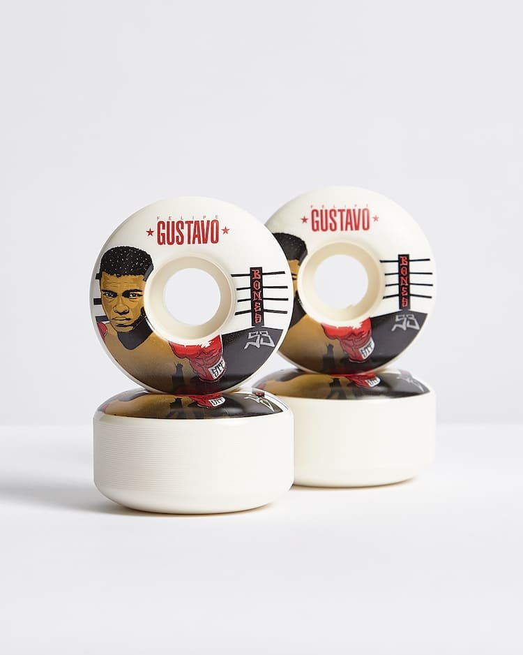 Skateboard wheels with Felipe Gustavo design and Bones branding.