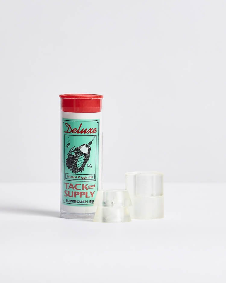 Deluxe skateboard bushings packaging with clear bushings