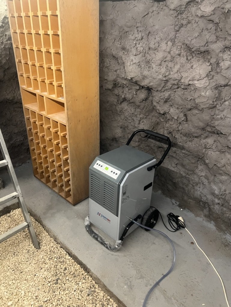 Dehumidifying