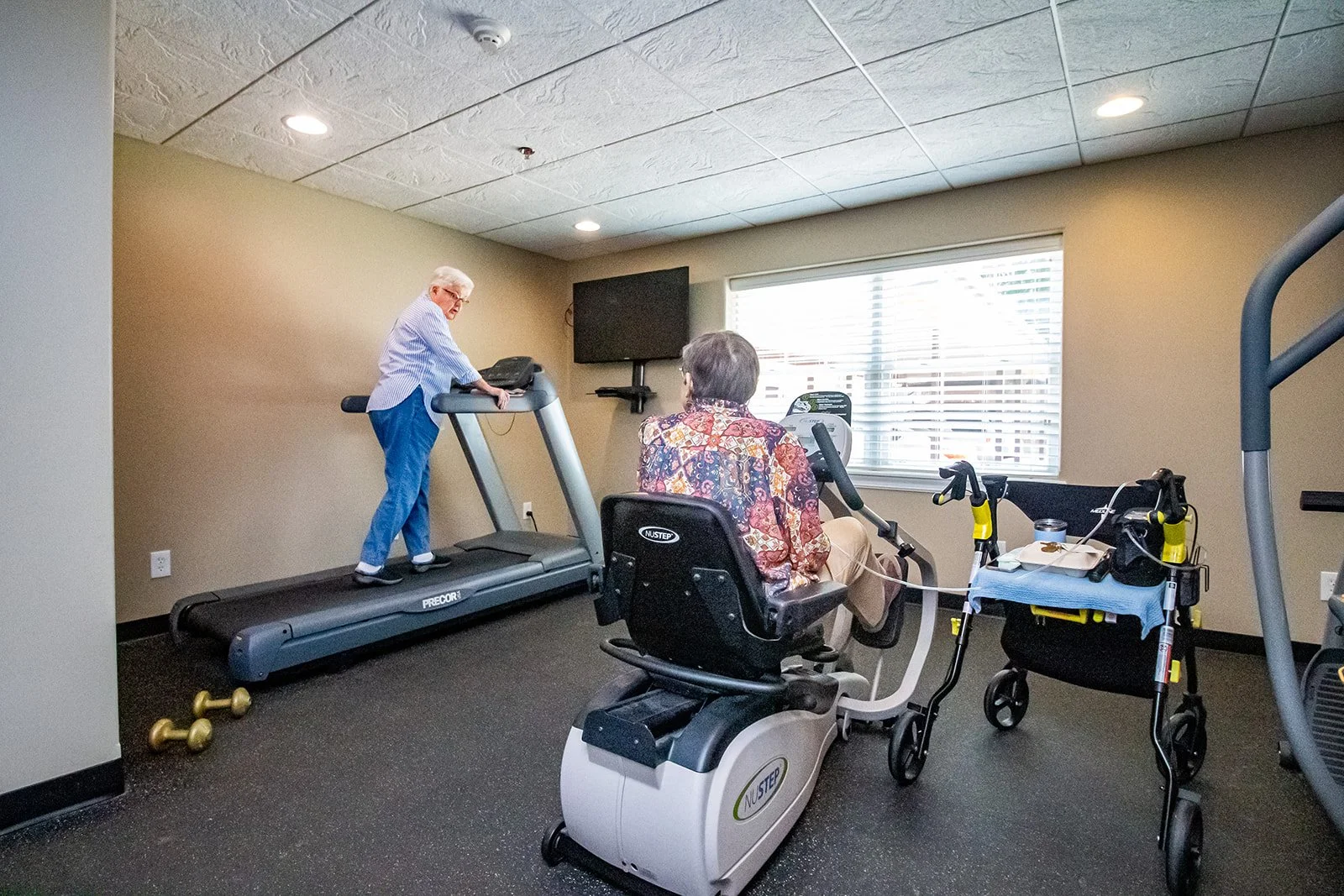 Residents Working Out in Fitness Room
