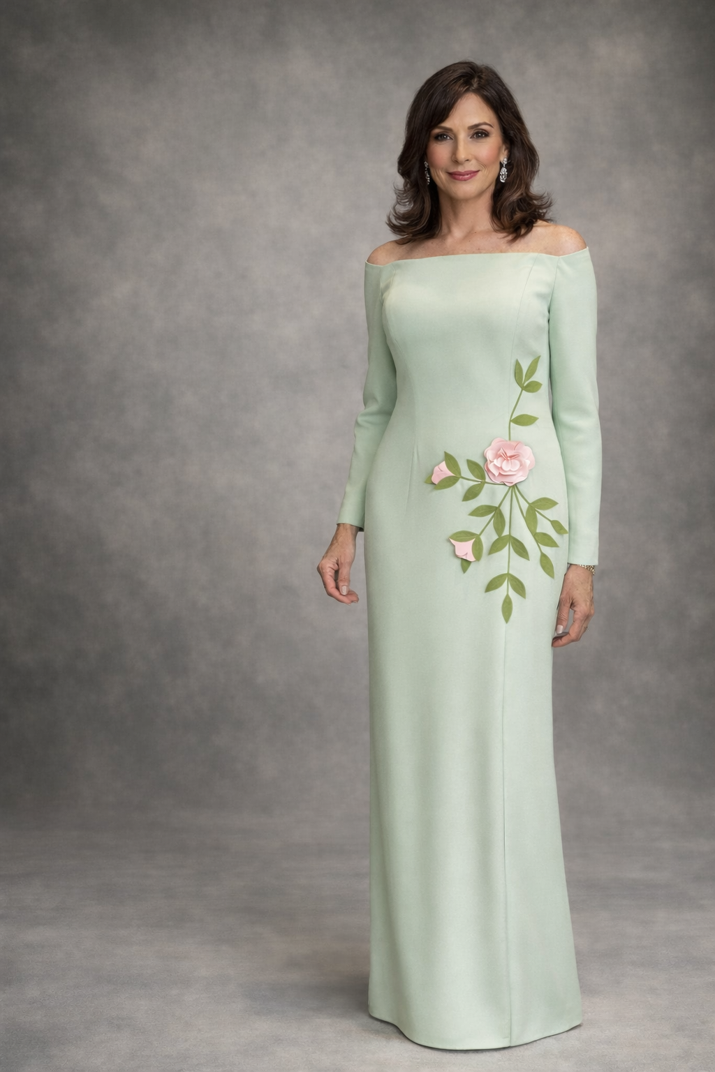 Sage green gown with long sleeve to keep a perfect modest elegance for any special occasion. Gown boasts a side slit and can be created in any silk color. 