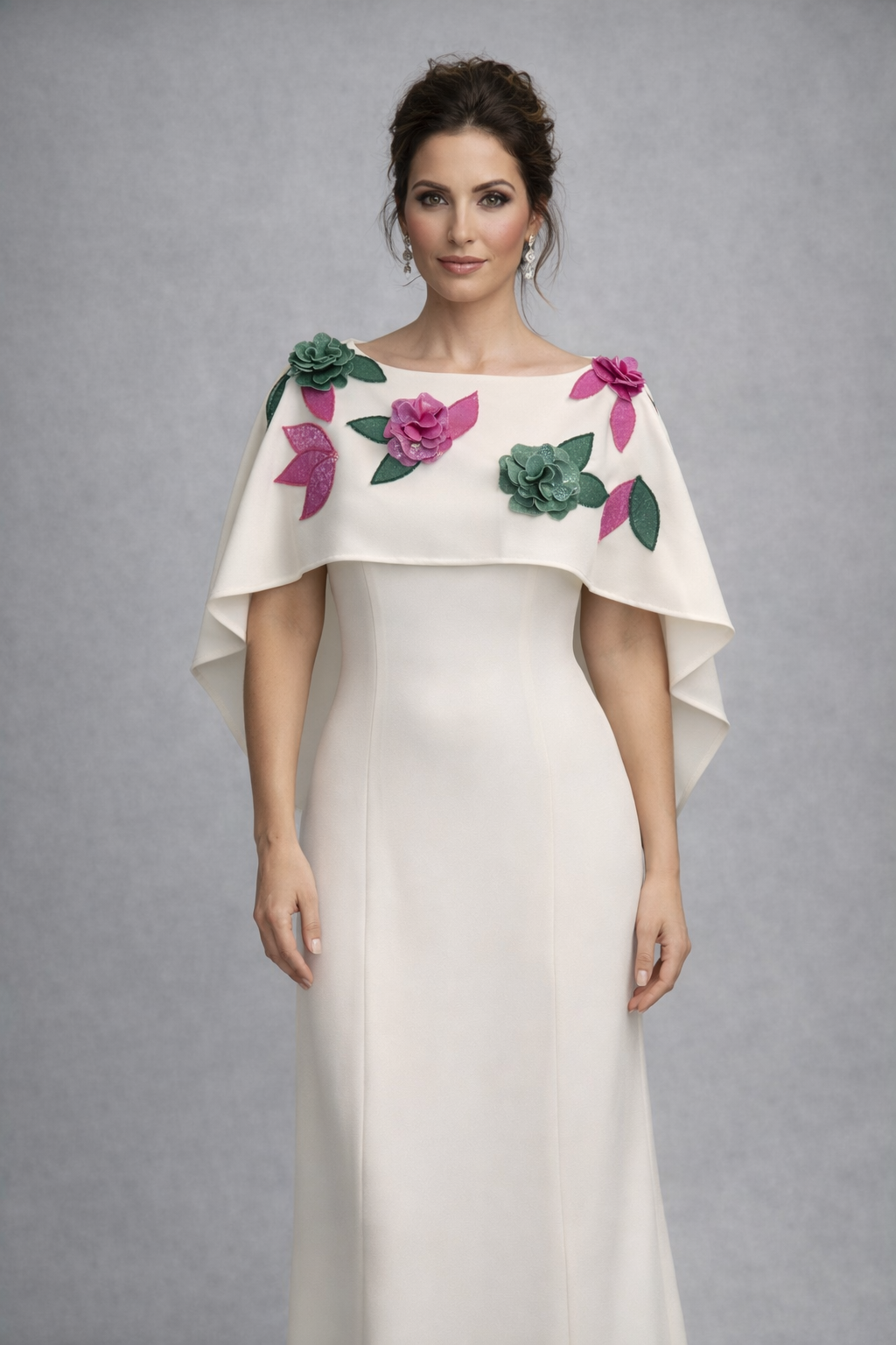 This white gown with floral details boasts the most elegant details for the wedding event of your dreams. Gown is silk and flows along the body line for the most elegant look. 