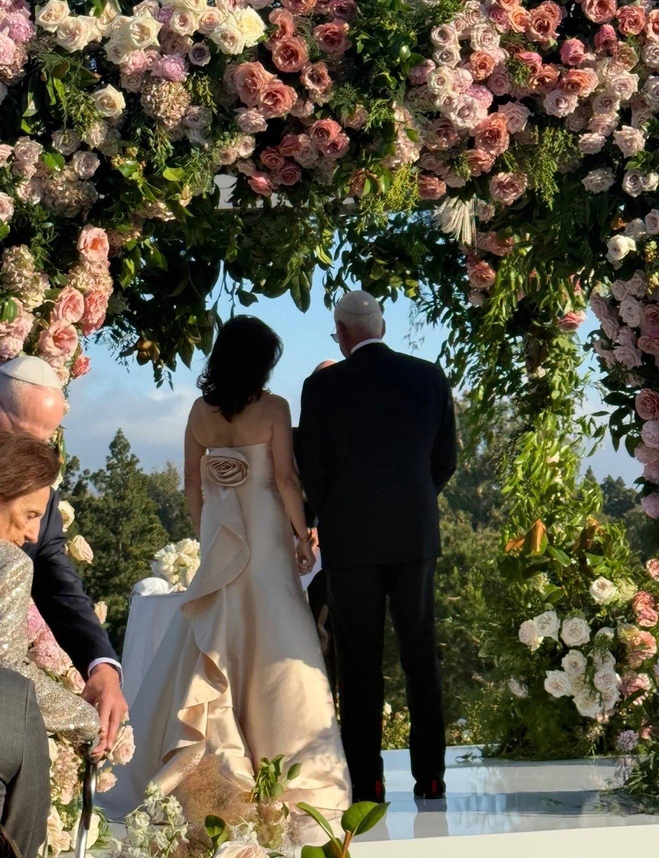 Not your average Bridal look. Rose detail on the back with a flowing silk skirt. Gorgeous for the beautiful golf course wedding. 