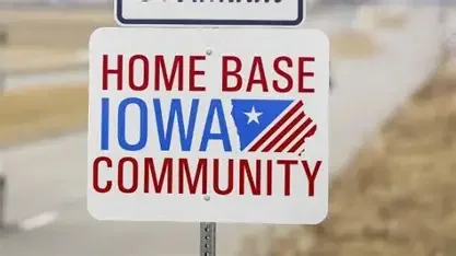 Home Base Iowa Community road sign