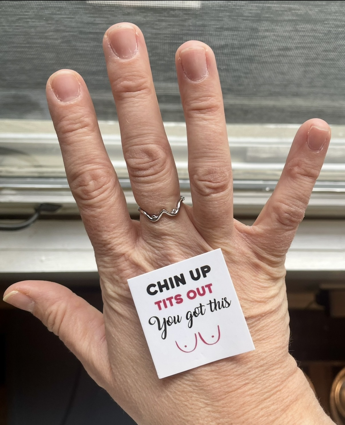 Chin up. Tits out.