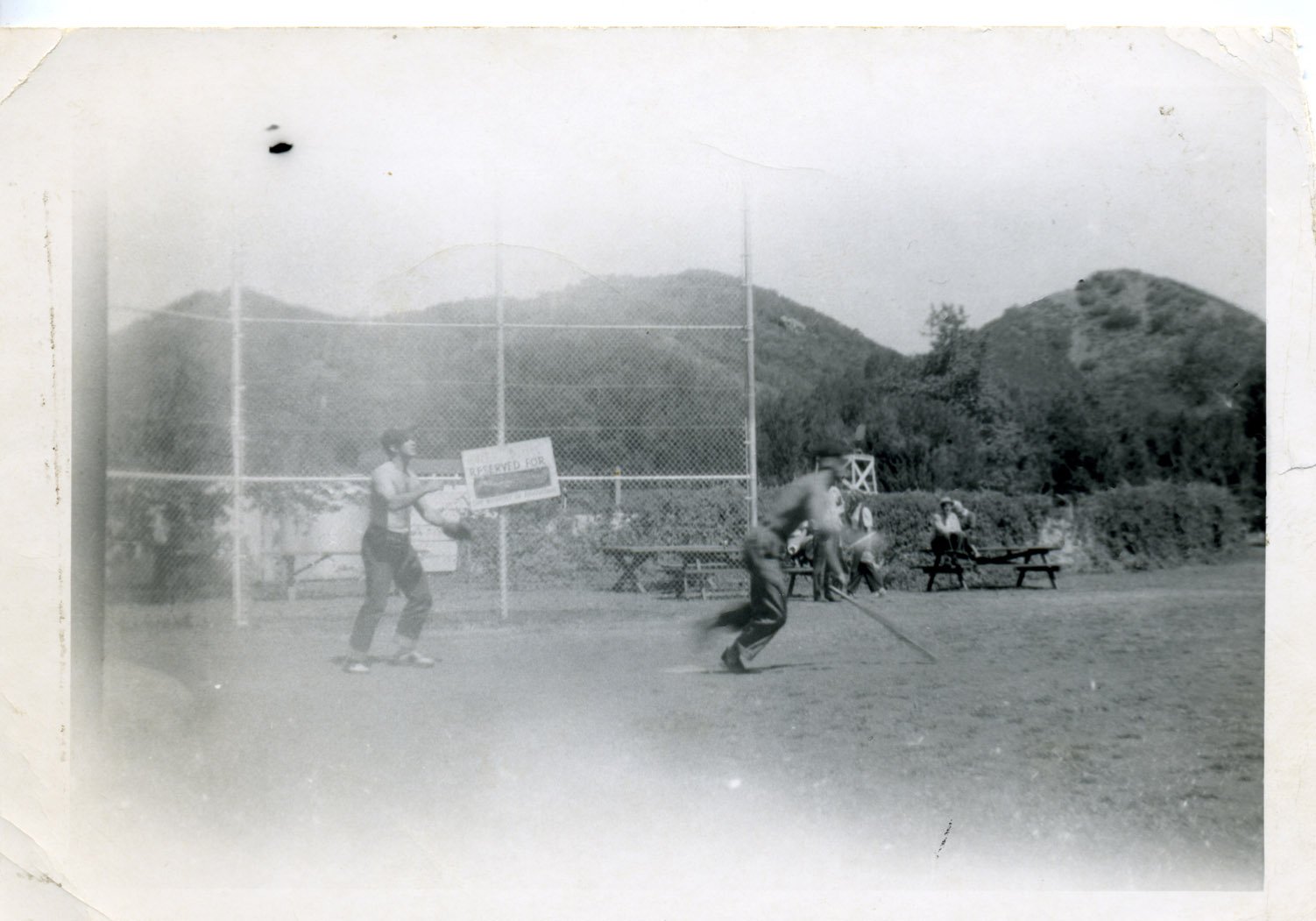 Playing baseball at Lake Enchanto