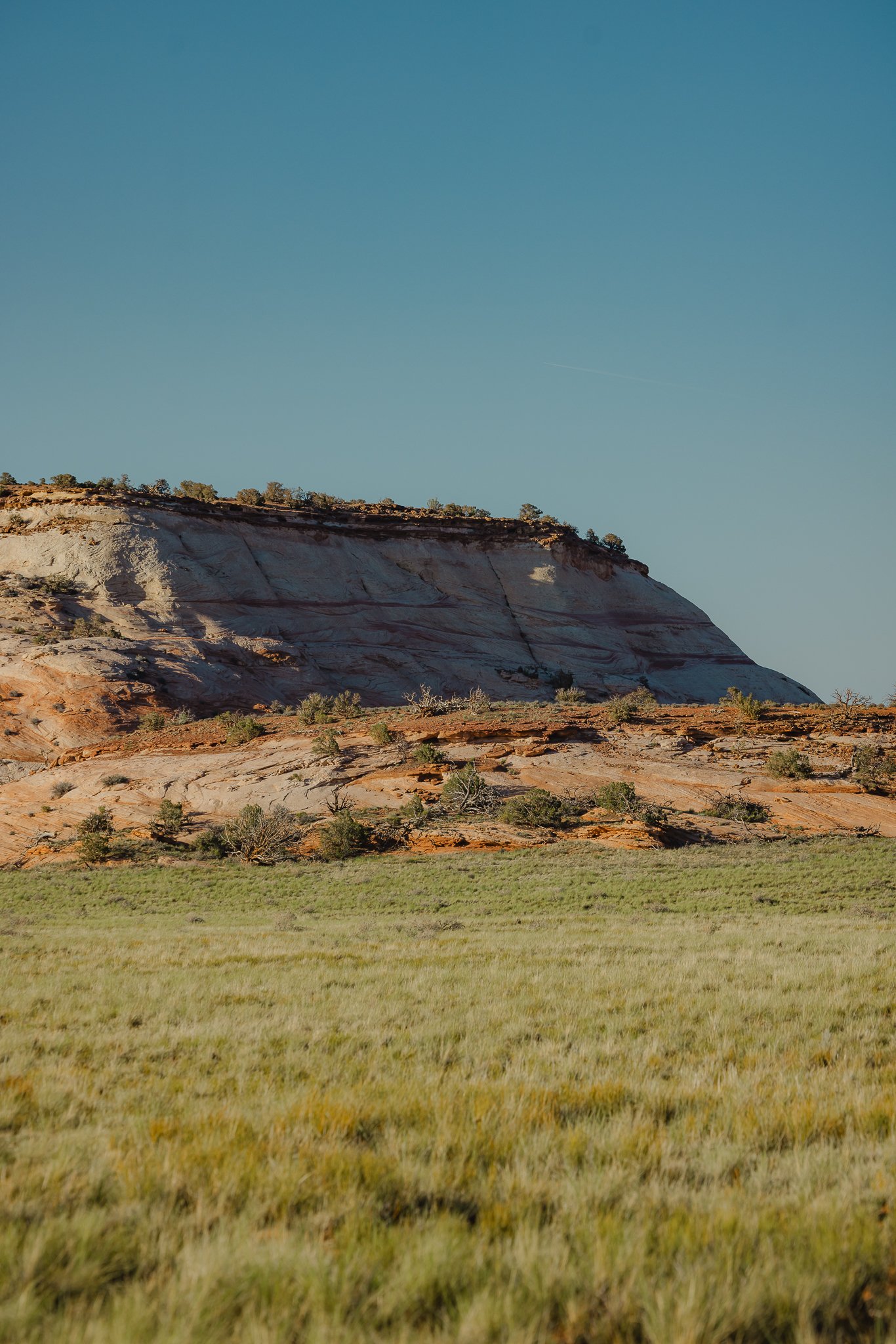 a colorful Aztec Butte rock wall