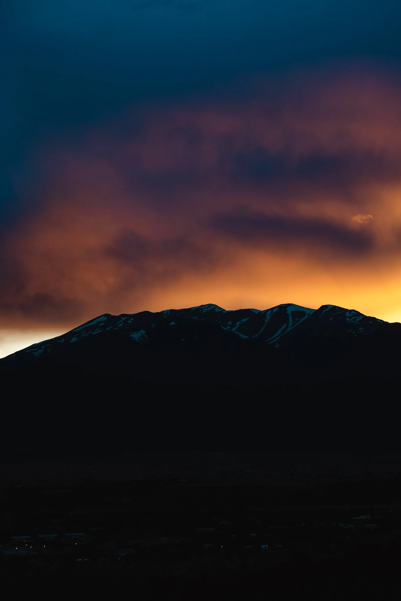 Orange sunset behind the Collegiate peaks
