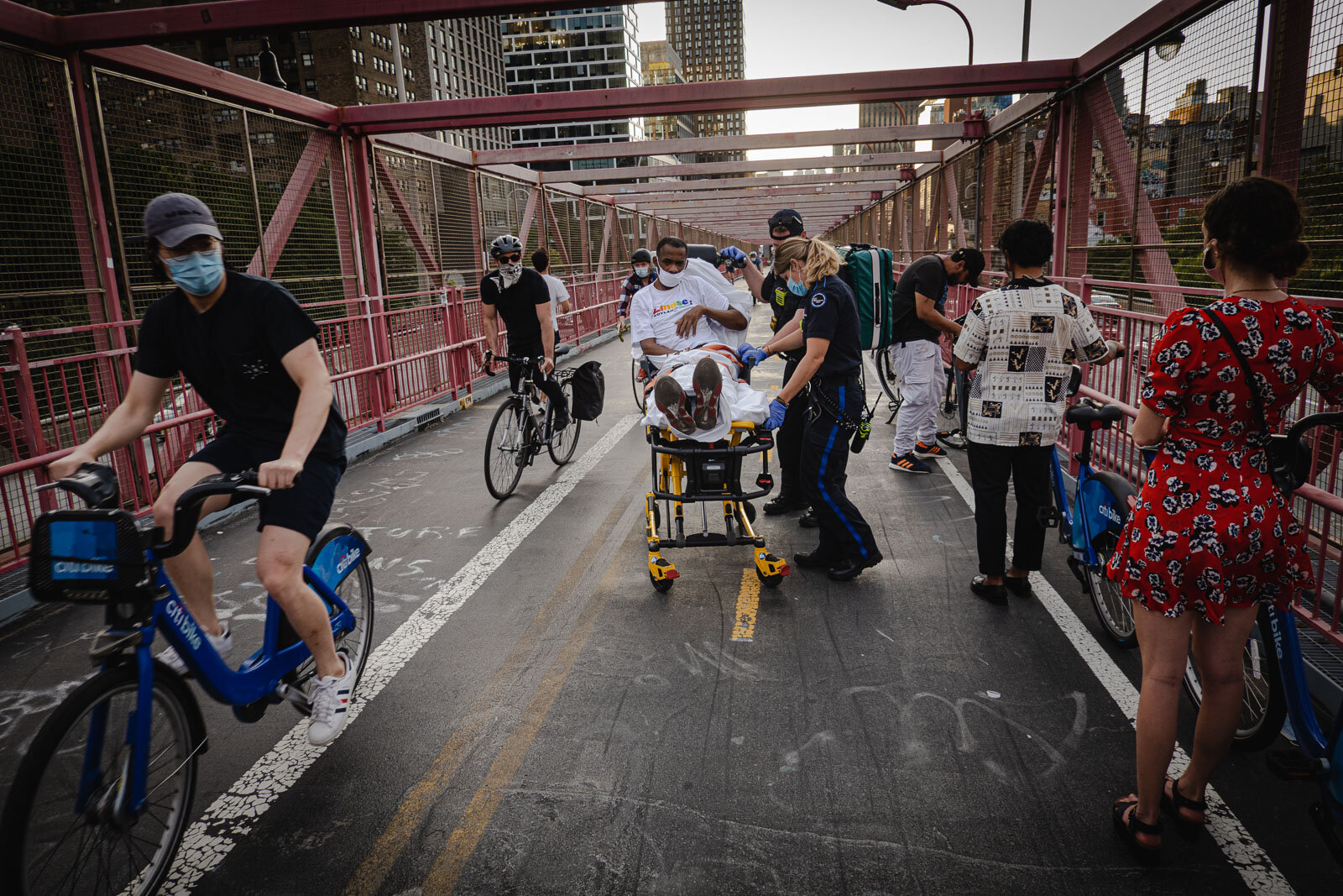  Bicycle crash, accident on the Williamsburg bridge, paramedica took the cyclist away on a stretcher.  Manhattan NY - photo by Stefano Giovannini 