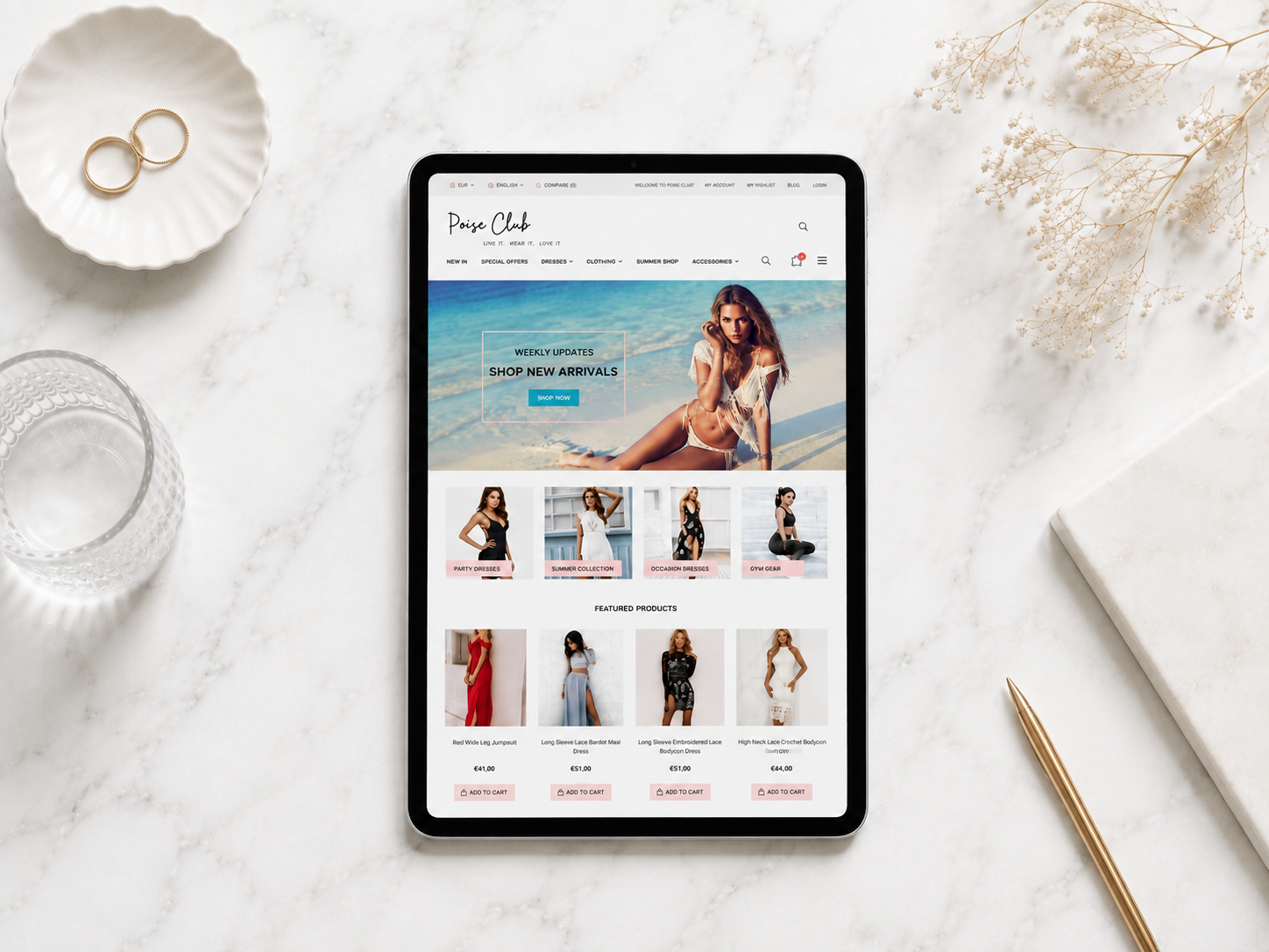 Poise Club fashion e-commerce website displayed on a portrait tablet on a white marble surface.