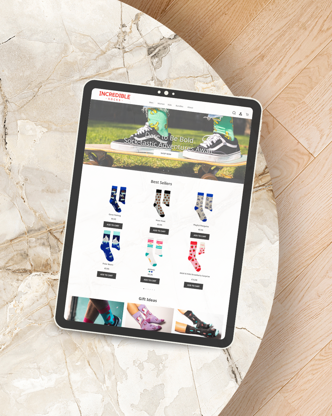 Incredible Socks Shopify homepage displayed on a tablet featuring colourful sock photography and product collections.