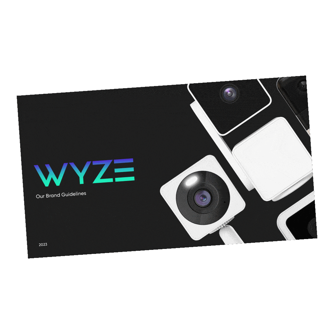WYZE brand guidelines booklet with images of multiple security cameras on the front cover.