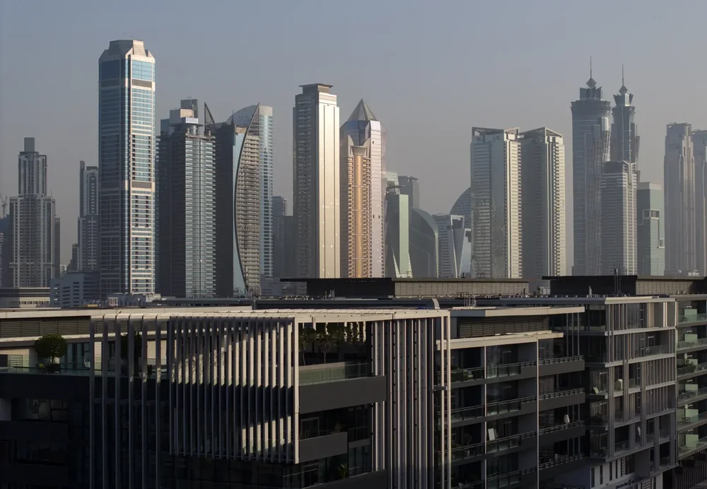 Dense cluster of modern skyscrapers in Dubai seen from the air