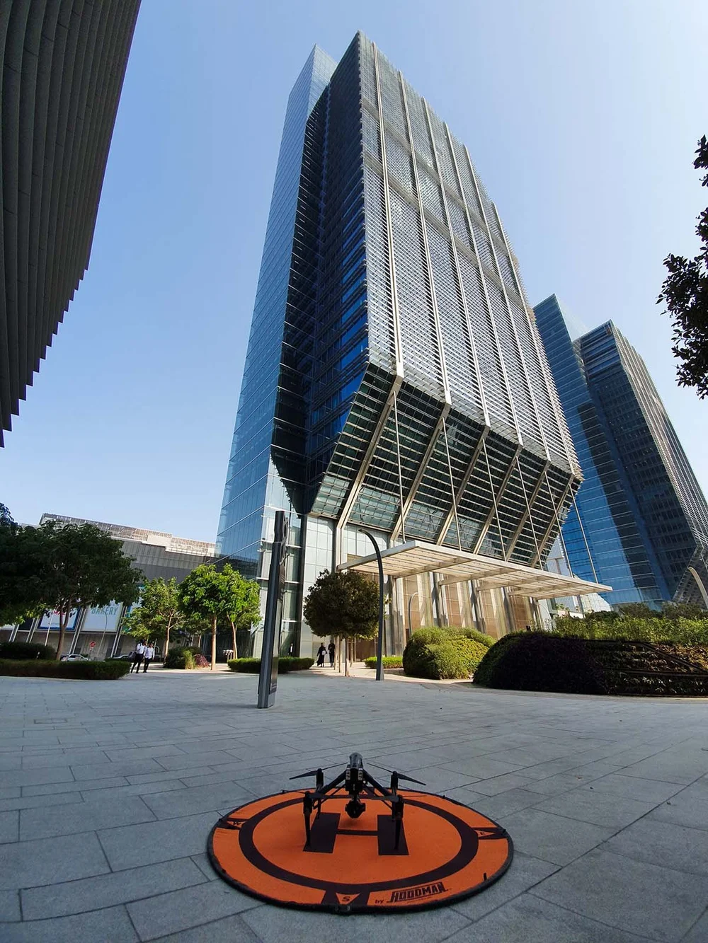Inspire 3 drone on its landing pad in front of the ADGM towers in Abu Dhabi