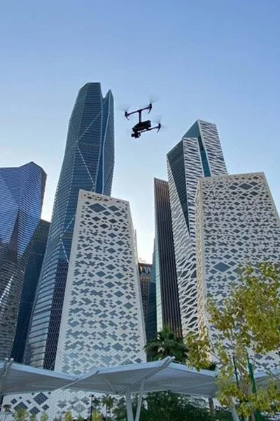 Camera drone flying between the towers of the King Abdullah Financial District in Riyadh