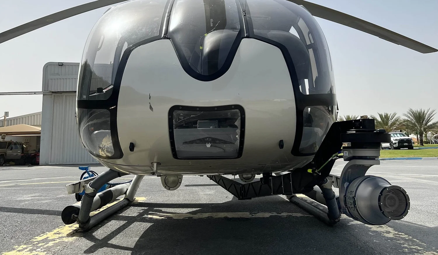 Helicopter on the apron with the Phase One 100-megapixel photogrammetry camera mounted in a gyro-stabilised head