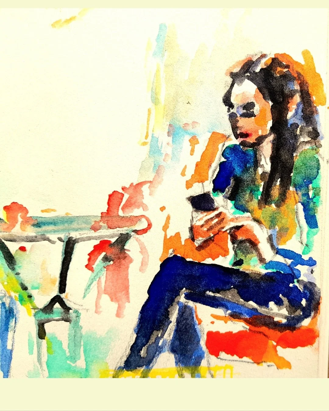 A watercolor painting of a woman sitting on a red chair, looking at her phone, with a table beside her. The scene is brightly colored with loose, abstract strokes.