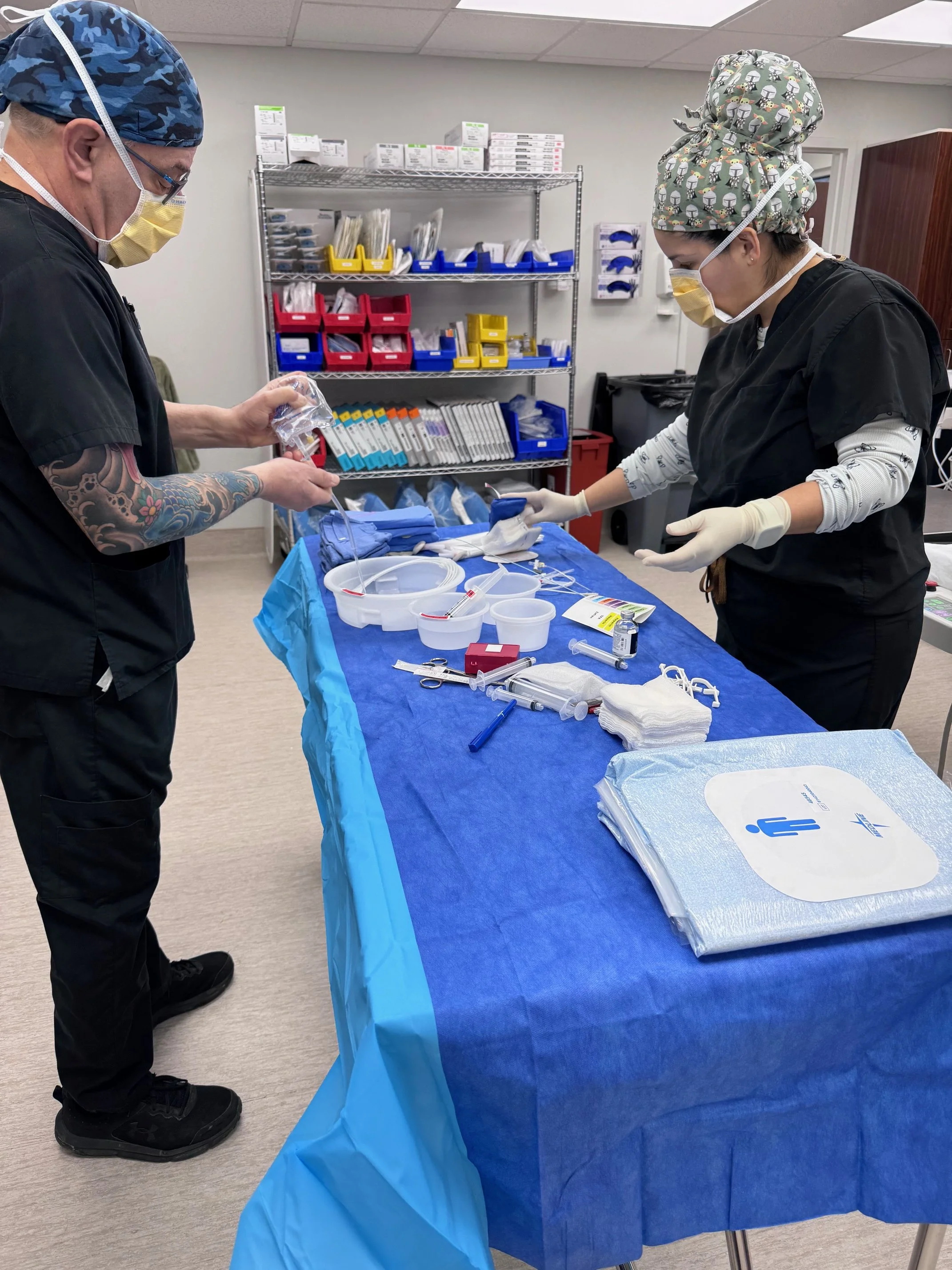 surgical techs organizing supplies pre-procedure