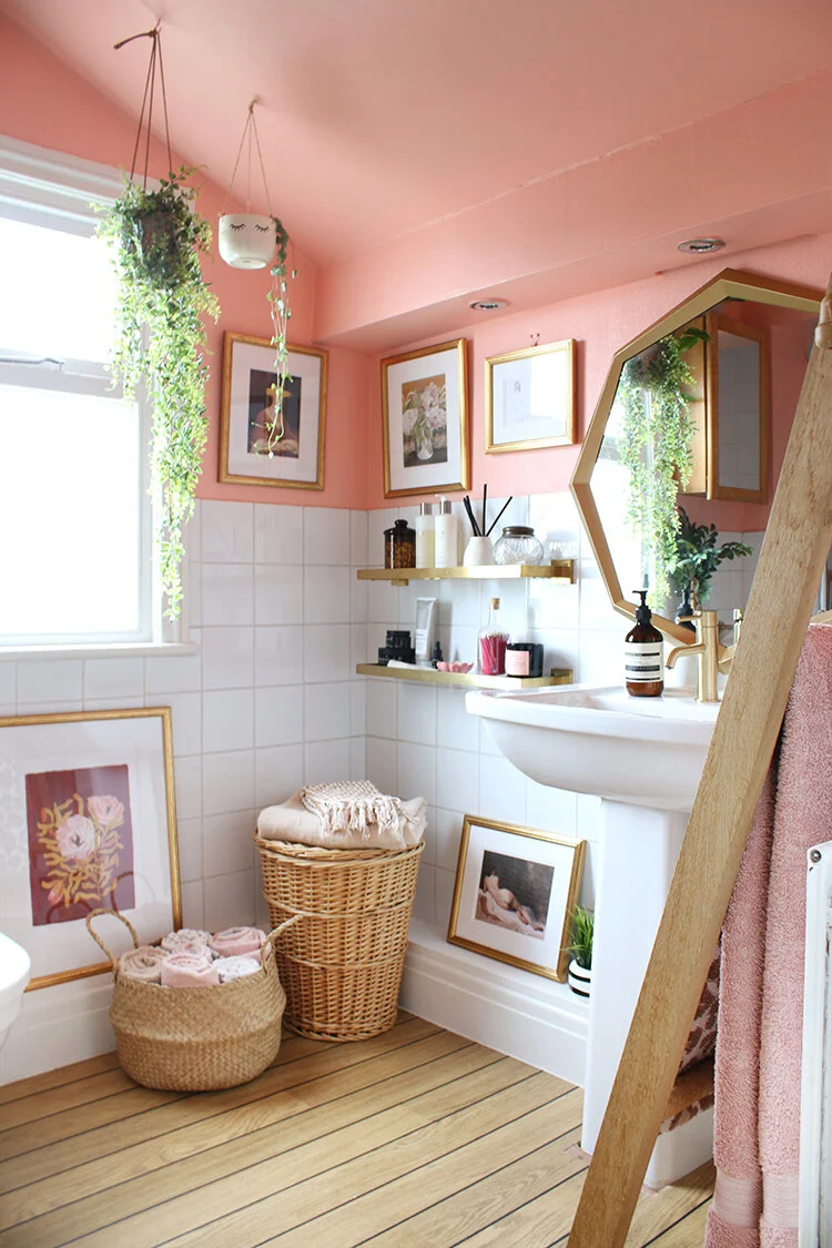 One of my favorite pins lately, from SwoonWorthy - Paint color is a custom mixed paint from UK brand Duluth called Peachy Keen. I love the idea of using a hue like this minimally or in a bathroom space like this.