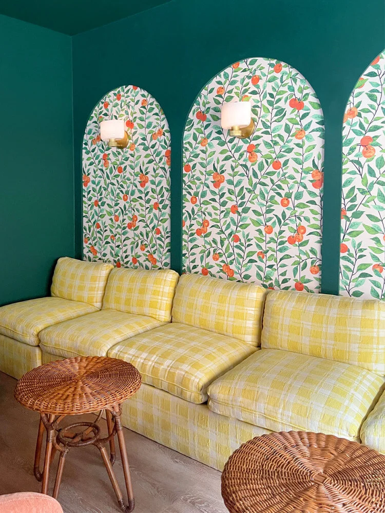 UM OK AT ALL OF THIS. Yes on the citrus wallpaper and YES YES! on the arched motif made from cut MDF boards. Design by Sarah Sherman Samuel, image via Domino.