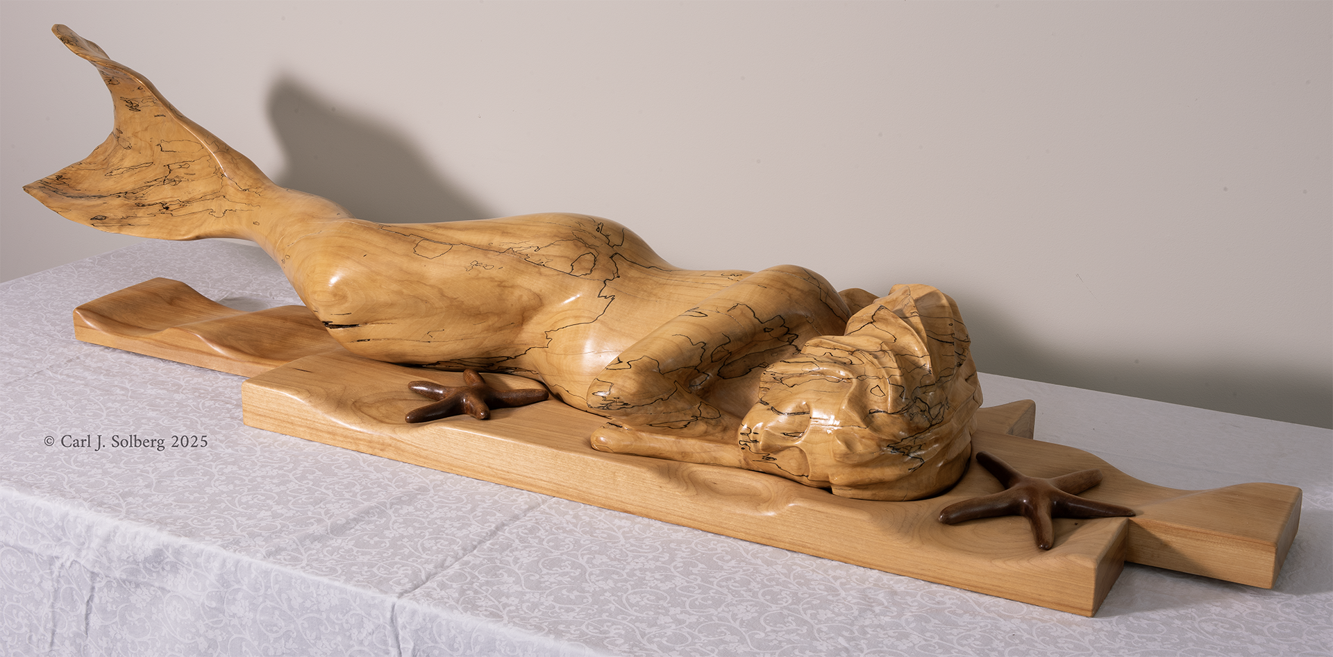 Carl_Solberg_Myth of Fundy Bay_64X14X14_carved chestnut-2022_$10,000.png
