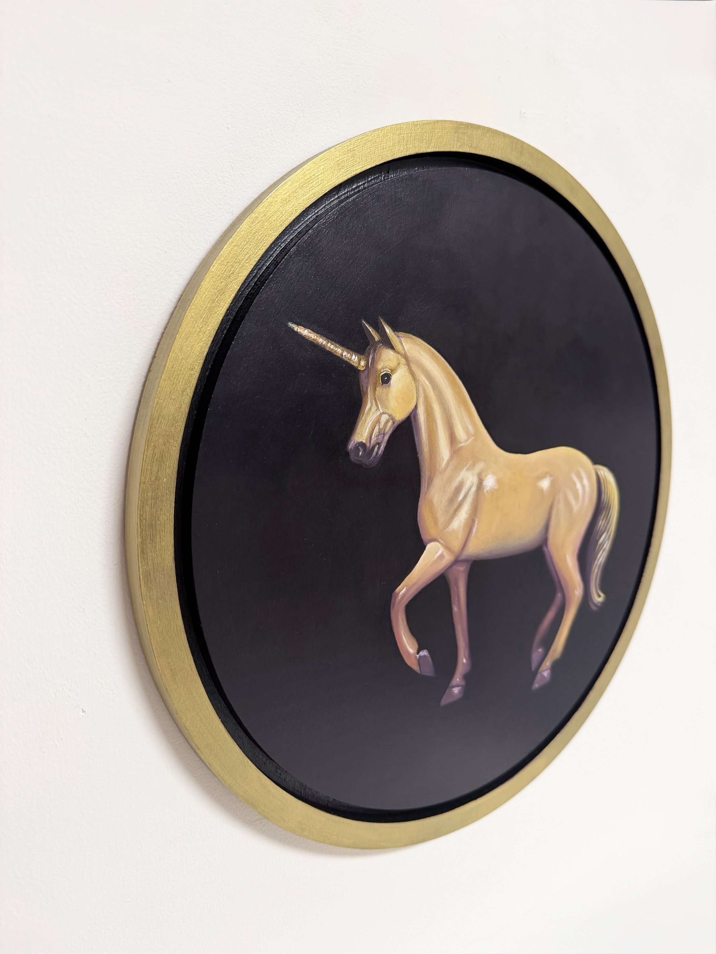 gold unicorn on black side 1.jpg