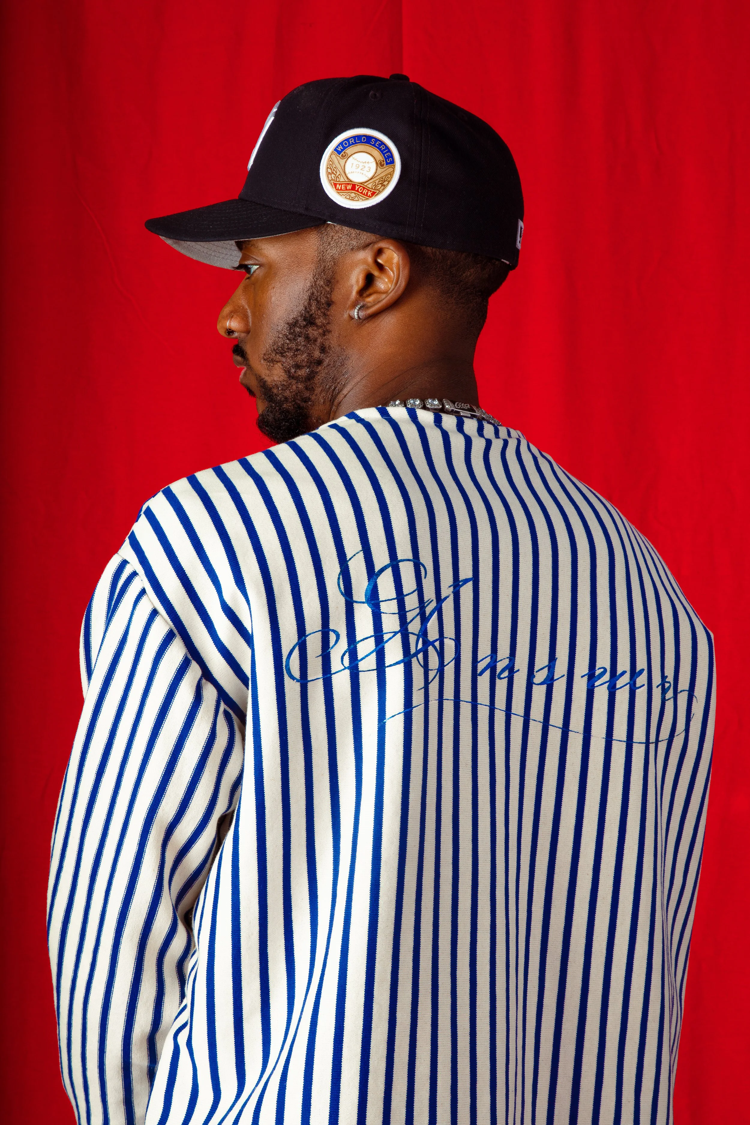 striped jacket turned to the leftinsta pls.jpg