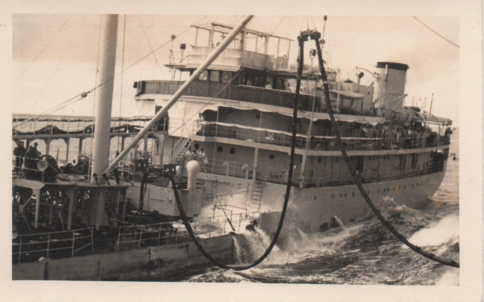 HMS Belfast 1949 RAS abeam Ranger Class RFA.jpeg