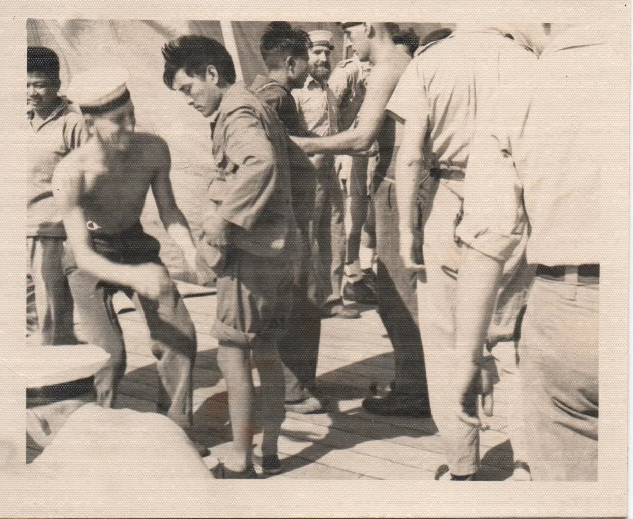 HMS Belfast  Nov 1949 Pratas Is _ today Dongsha and Tungsha atoll Chinese Nationalist sailors who ran aground 3.jpeg