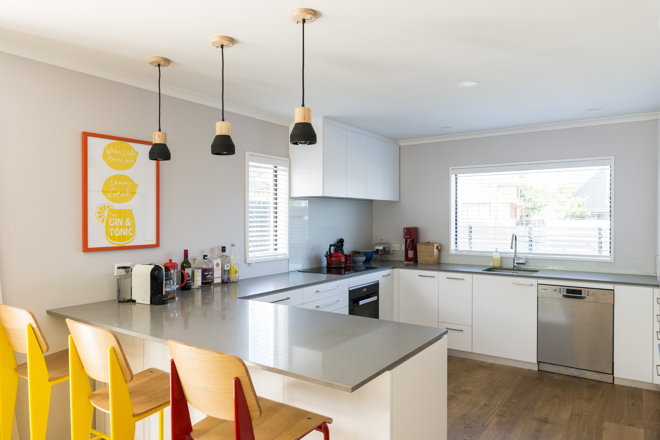 Maximising benchspace makes this kitchen functional for a busy family.