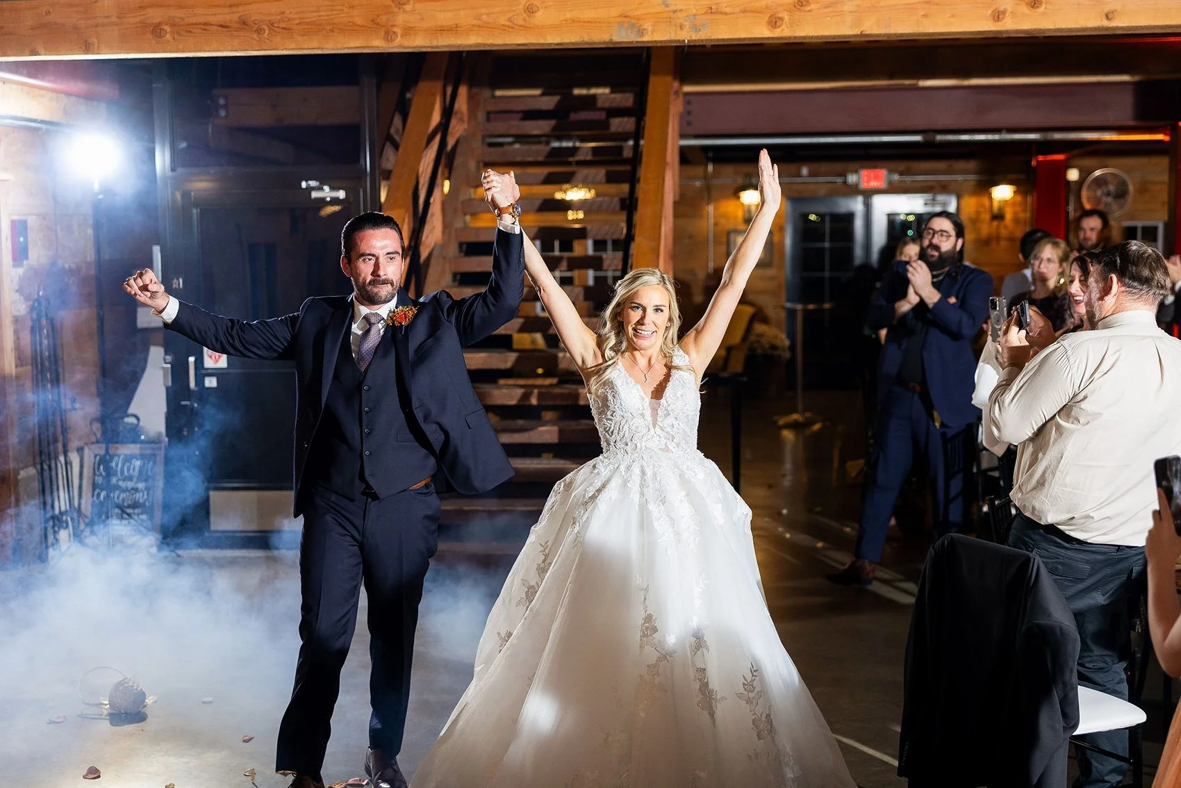 Epic grand entrance at autumn barn wedding