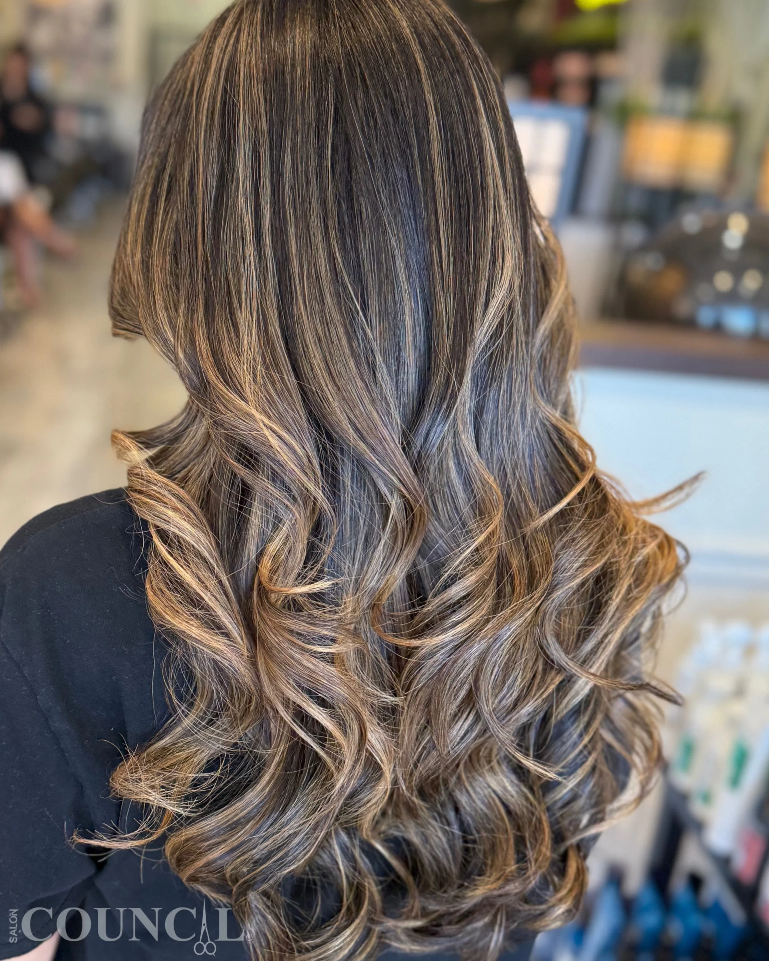 Cream soda tones with the perfect brunette contrast.
This look combines balayage and foilyage techniques to create soft dimension, brightness, and a seamless blend against her natural dark brown base.

Color created by Allan @filamhairartist at Salon