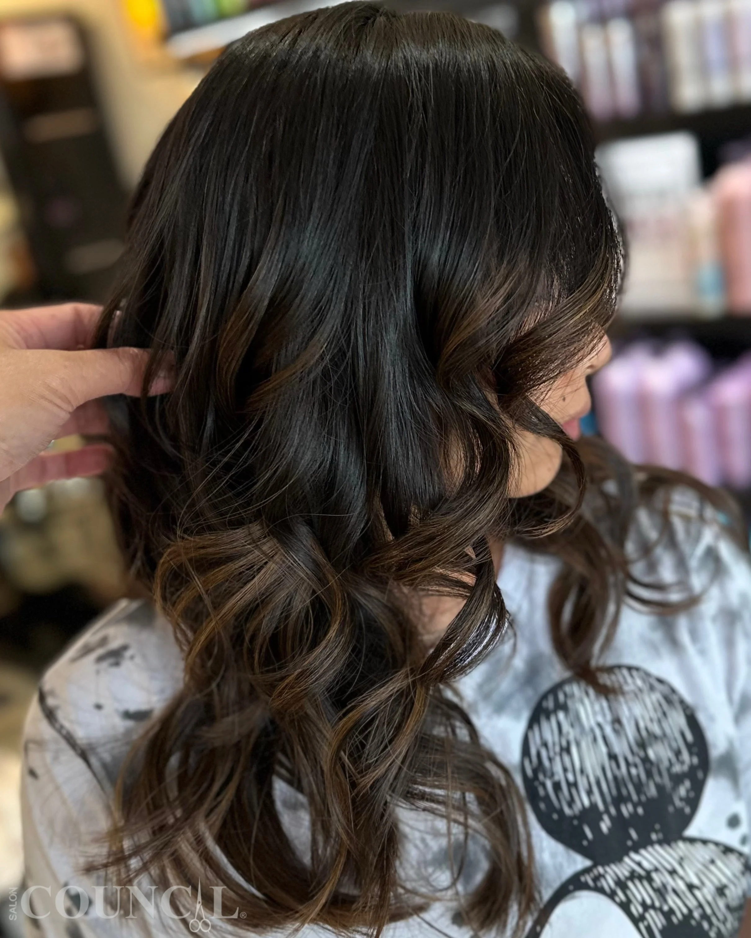Sometimes less is more.

This brunette dimensional balayage was designed to add just the right amount of lightness to long, dark hair&mdash;creating soft contrast, natural dimension, and effortless movement without overpowering the natural beauty of 
