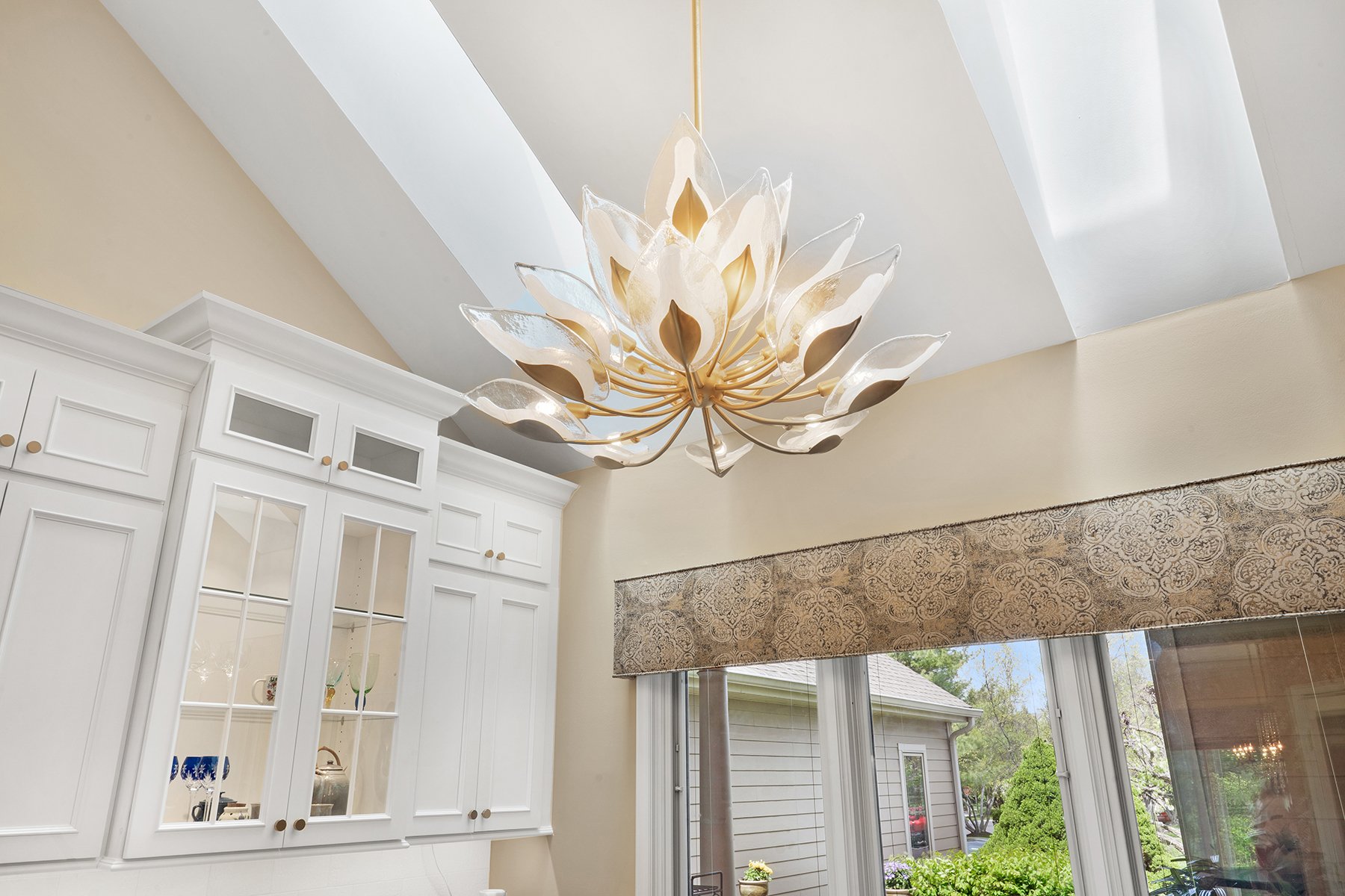 A stunning light fixture provides added elegance