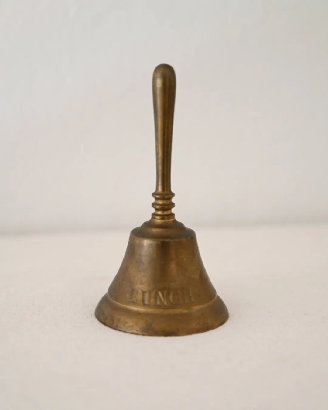 Two of the daintiest little finds just got in! 🤏

First, the cutest little brass &quot;lunch&quot; bell with lovely even wear throughout.

And second, a tiny colonial style  oil lamp, often not found with its hobnail chimney in tact. These aren't li