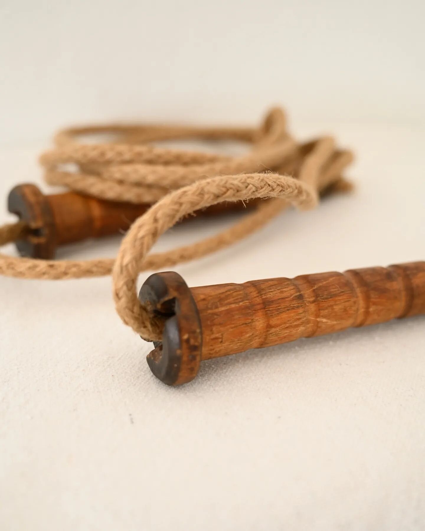 This beautiful antique jump rope is truly a special piece. The Salt's Mill Textile Factory opened in 1851 in the Victorian village of Saltaire in West Yorkshire, England.

The tightly woven jute fibers are delicately strung through the bobbins as the