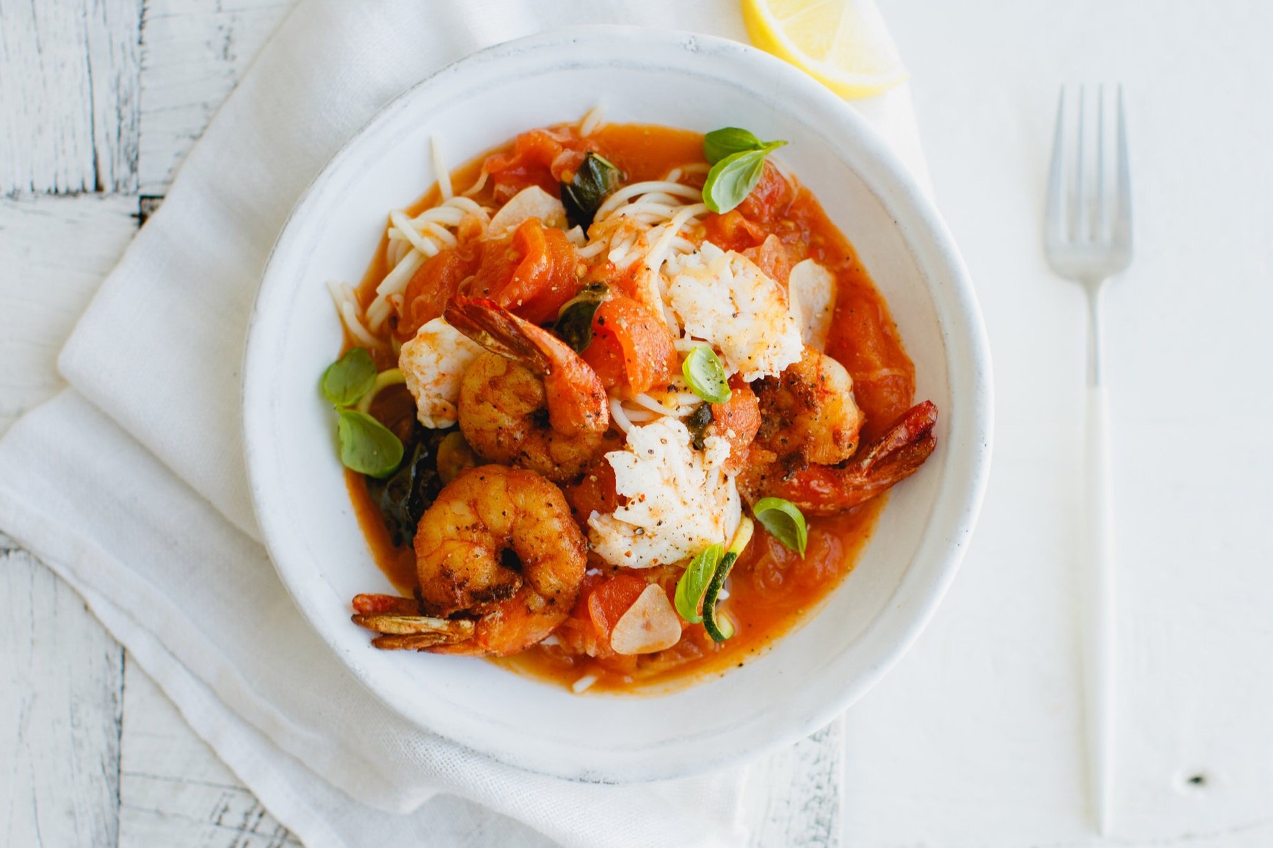 PRAWN &amp; CRAB SPAGHETTI   Served in a light tomato broth, seasoned with fresh herbs and organic chilli.    View  all meals  or  create a plan
